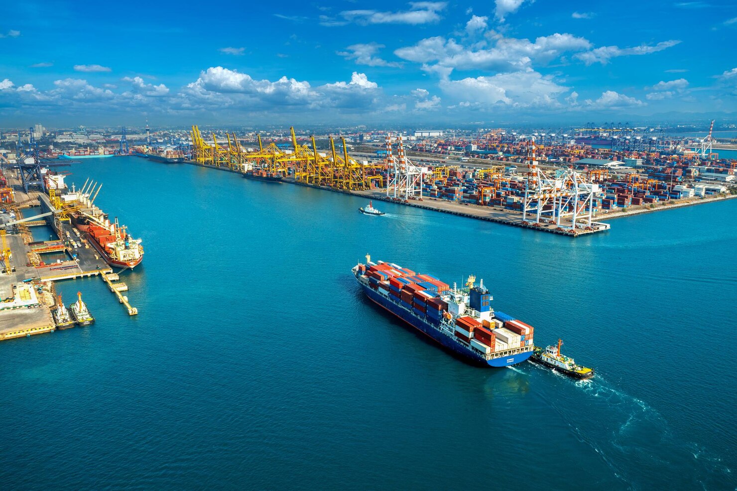 aerial-view-cargo-ship-cargo-container-harbor_335224-1374